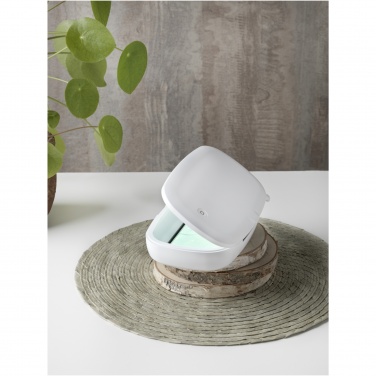 Logotrade promotional giveaway image of: Capsule UV smartphone sanitizer with 5W wireless charging pad